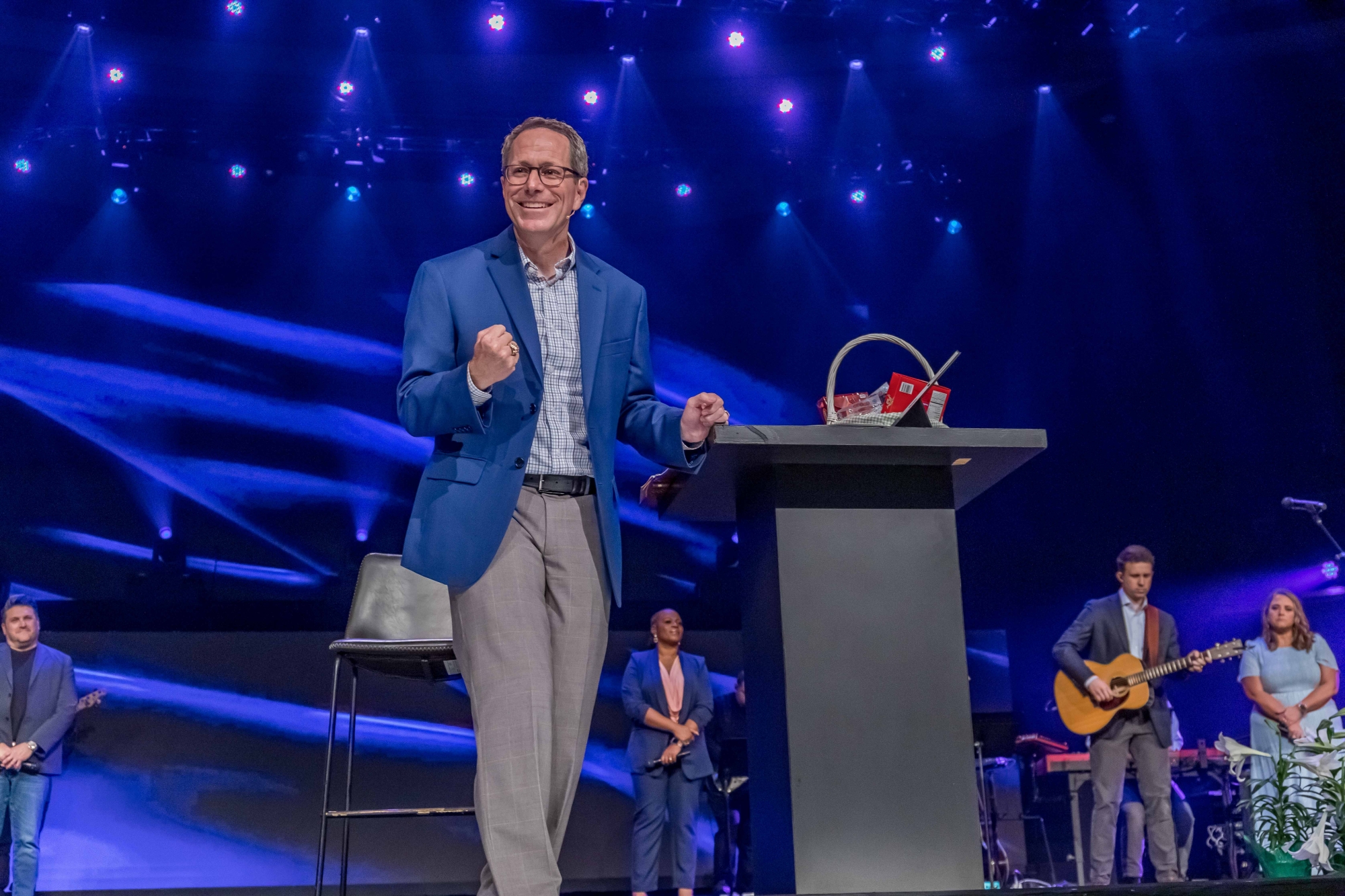 Pastor Greg on stage with the Worship Band