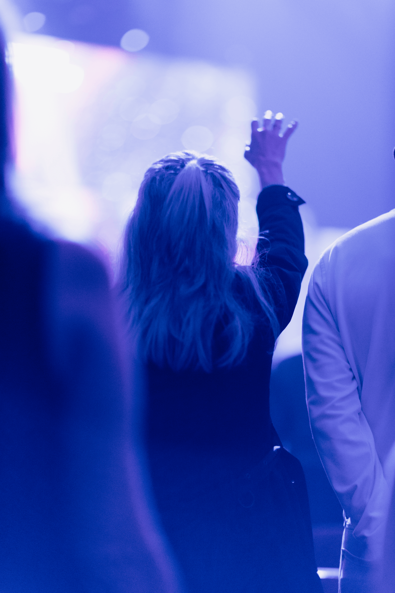 Woman worshipping Jesus at HFBC